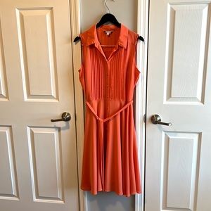 Peach colored, knee length dress